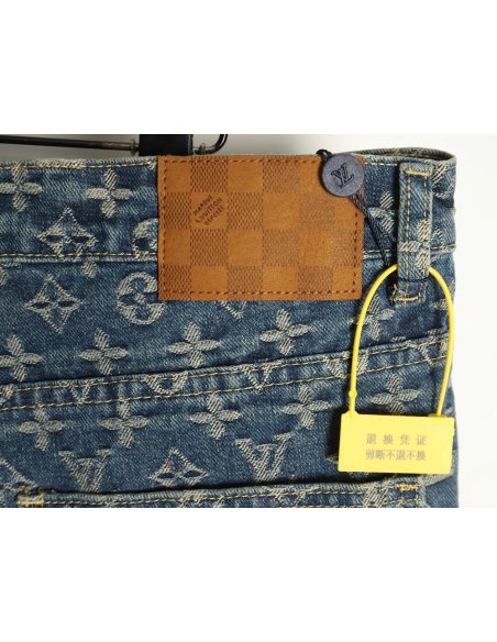 Louis Vuitton washed blue jeans with all-over print and side straps,Louis Vuitton
